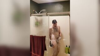 Caught in the douche soaping up, shaving, jerking