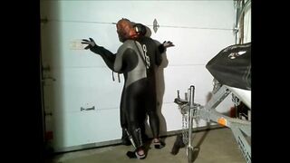 wetsuited spiderman grabs orca