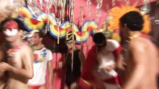 The boys after the carnival arch each other in a rear end stance