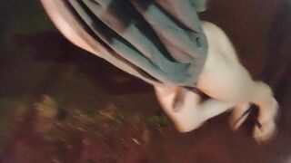 Femboy walks outdoors nude