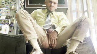 suited fellah is opening up gams like tramp and plays with his malepussy with locked weenie